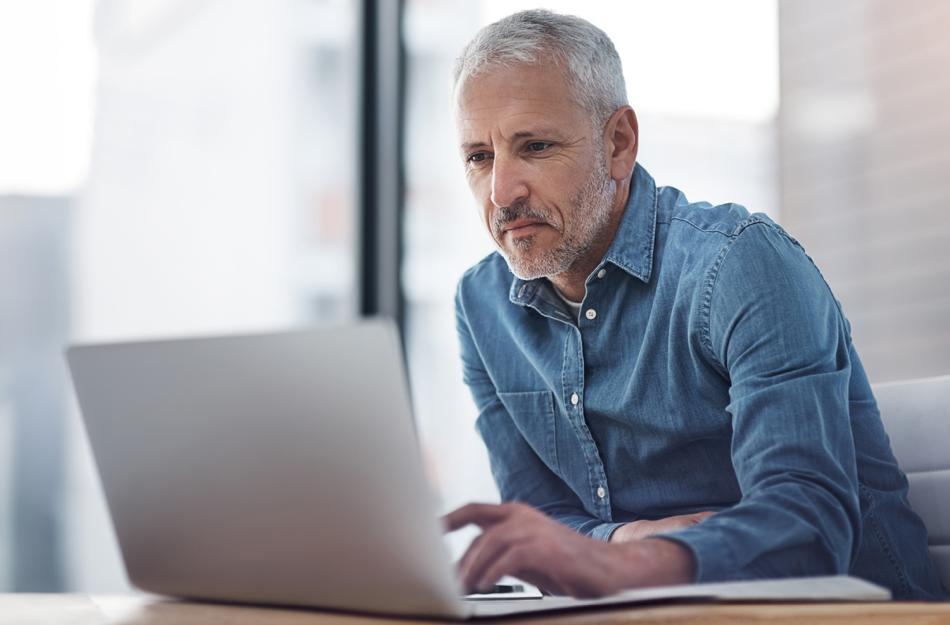 Man looking at a computer