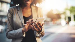 woman looking at her phone